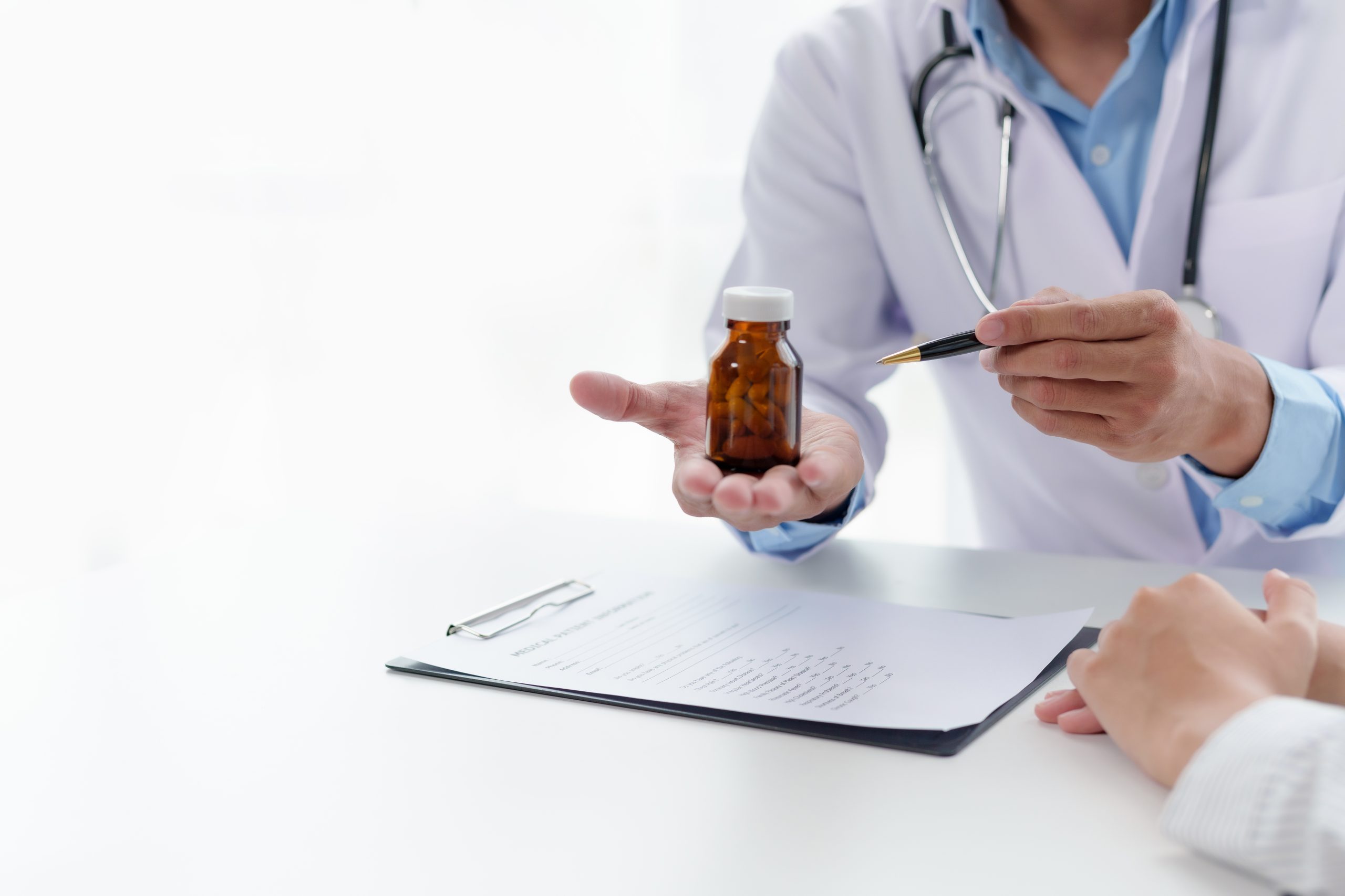 Doctor is explaining the drug information to the patient and rec